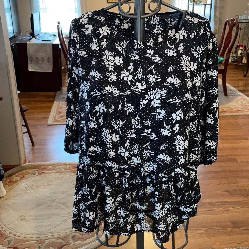 Ladies pull over top with 5” gathered ruffle hem